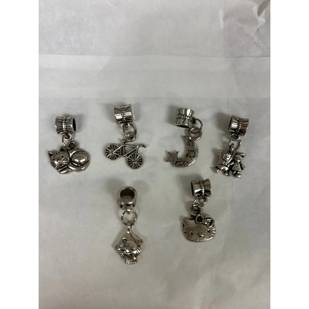 6 silver colored charms for‎ charm bracelet